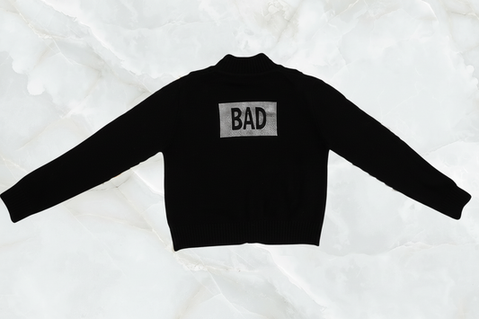 Jersey Knit Bomber Jacket with Covered Buttons and BAD in Rectangle on Back